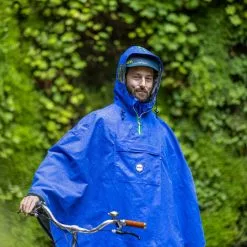 Le Temps Des Grenouilles Poncho De Pluie ADULTE - Coloris Unis 29 Le Temps Des Grenouilles Poncho De Pluie ADULTE - Coloris Unis -Casques vélo Soldes cape de pluie le temps des grenouilles bleu flashy pop